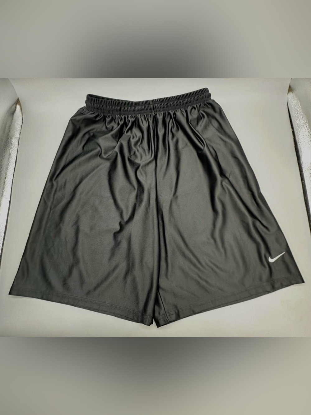 Nike athletic Boys/Kids shorts with a small white Swoosh logo on the left leg